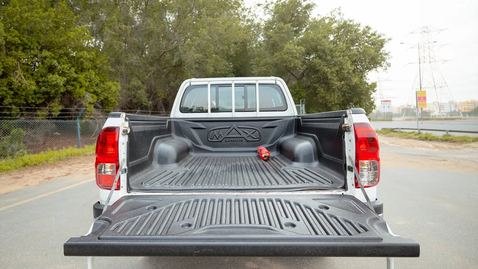 Used 2019 Toyota Hilux DLX Double Cabin in White – Boot / Trunk Space Open View for Sale at First Choice Cars Dubai Sharjah