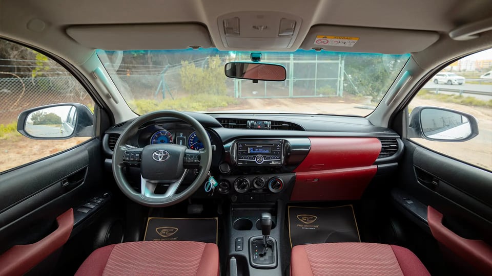 Used 2019 Toyota Hilux DLX Double Cabin in White – Front Cabin / Dashboard Full View for Sale at First Choice Cars Dubai Sharjah
