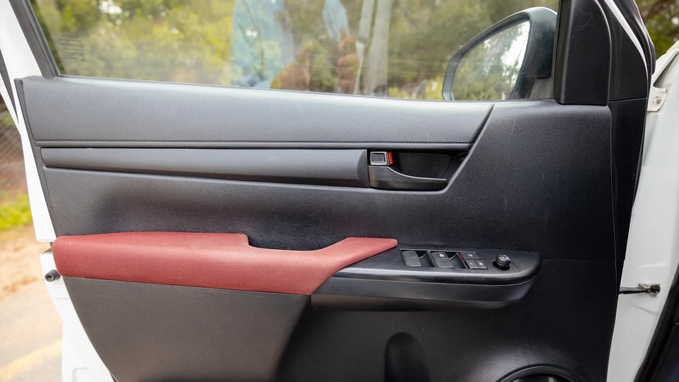 Used 2019 Toyota Hilux DLX Double Cabin in White – Driver Door Panel Full View for Sale at First Choice Cars Dubai Sharjah