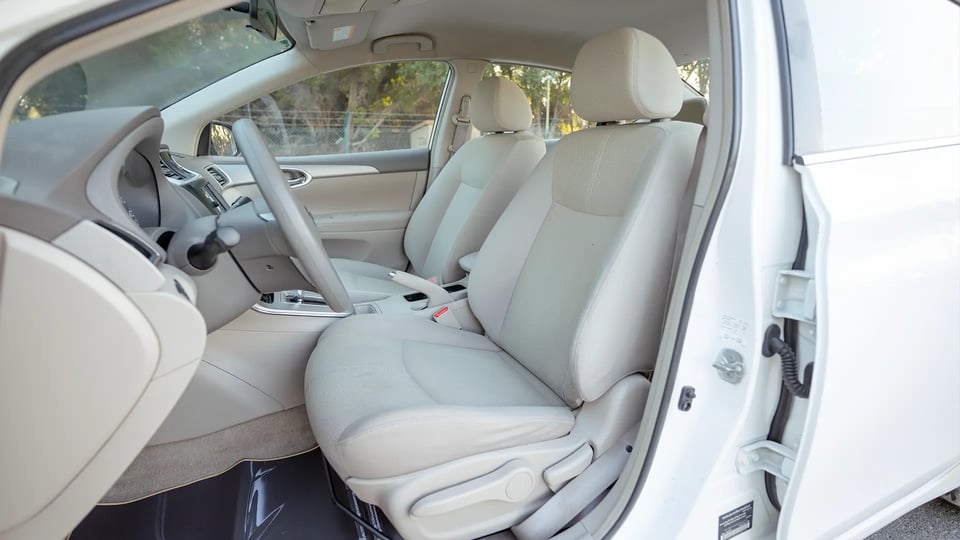 Used 2019 Nissan Sentra S in White – Front Driver Side Cabin View for Sale at First Choice Cars Dubai Sharjah