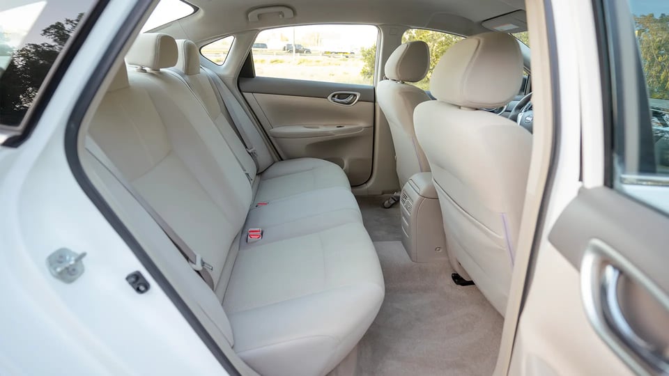 Used 2019 Nissan Sentra S in White – Rear Passenger Side Cabin View for Sale at First Choice Cars Dubai Sharjah