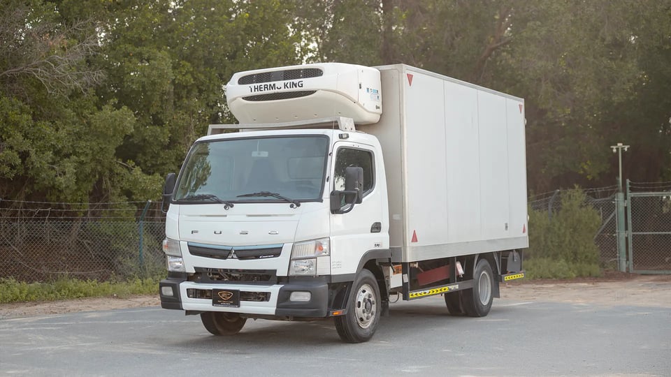Used 2020 Mitsubishi Canter Chiller Box in White – Left Front Diagonal (45°) View for Sale at First Choice Cars Dubai Sharjah