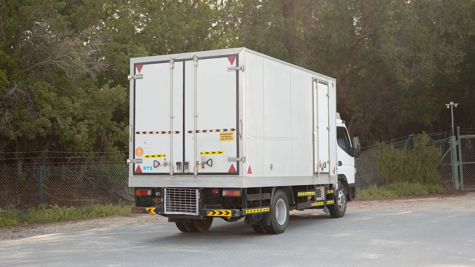Used 2020 Mitsubishi Canter Chiller Box in White – Right Back Diagonal (45°) View for Sale at First Choice Cars Dubai Sharjah
