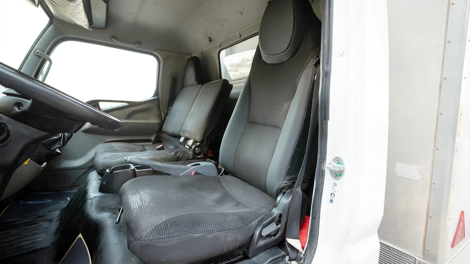 Used 2020 Mitsubishi Canter Chiller Box in White – Front Driver Side Cabin View for Sale at First Choice Cars Dubai Sharjah