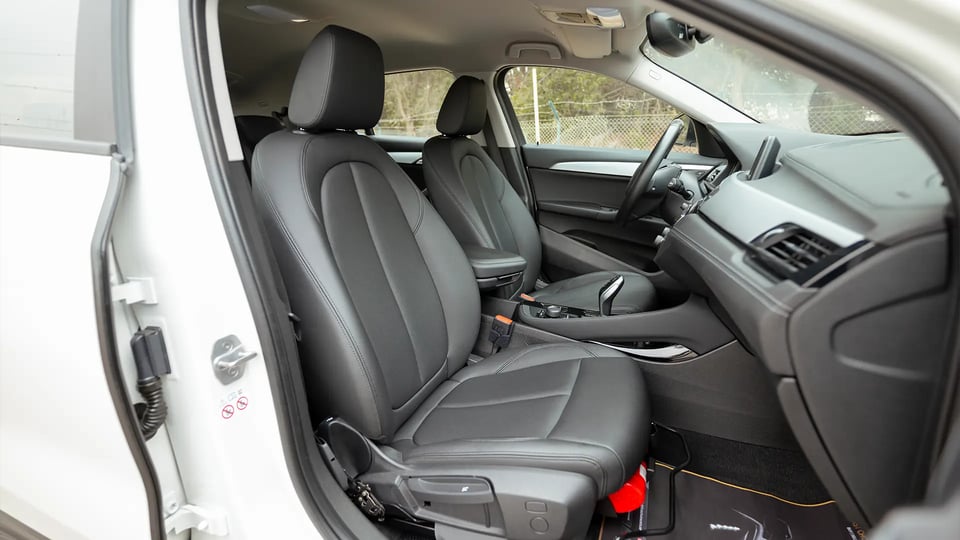 Used 2020 BMW X2 S-Drive 20i in White – Front Passenger Side Cabin View for Sale at First Choice Cars Dubai Sharjah