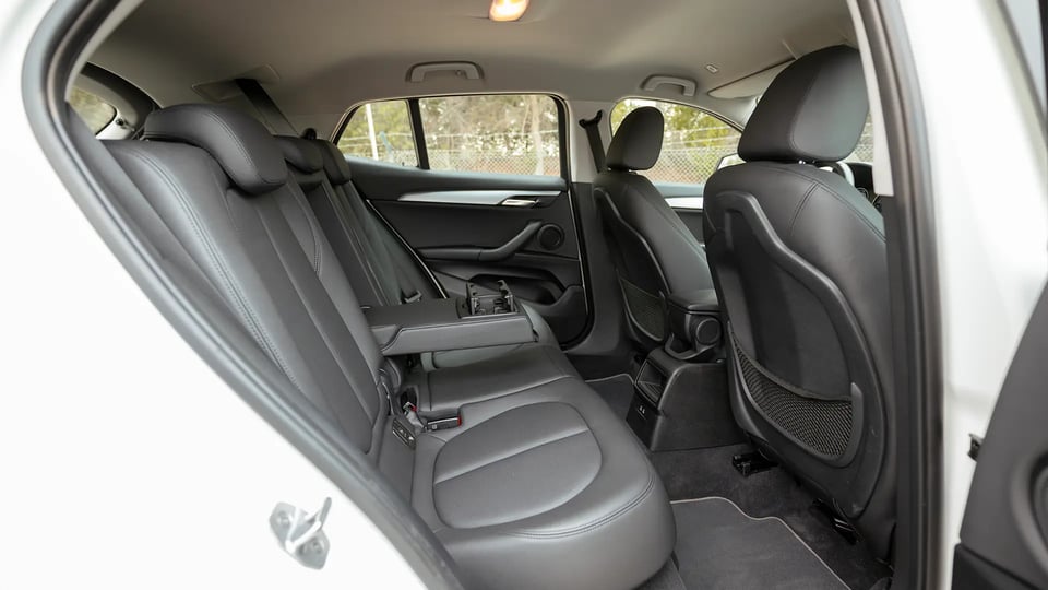 Used 2020 BMW X2 S-Drive 20i in White – Rear Passenger Side Cabin View for Sale at First Choice Cars Dubai Sharjah