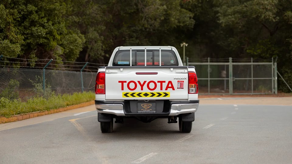 Used 2024 Toyota Hilux GL Double Cabin in White – Back/Rear View for Sale at First Choice Cars Dubai Sharjah