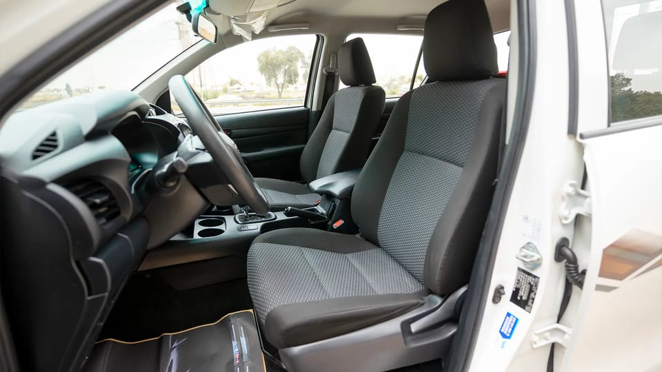 Used 2024 Toyota Hilux GL Double Cabin in White – Front Driver Side Cabin View for Sale at First Choice Cars Dubai Sharjah