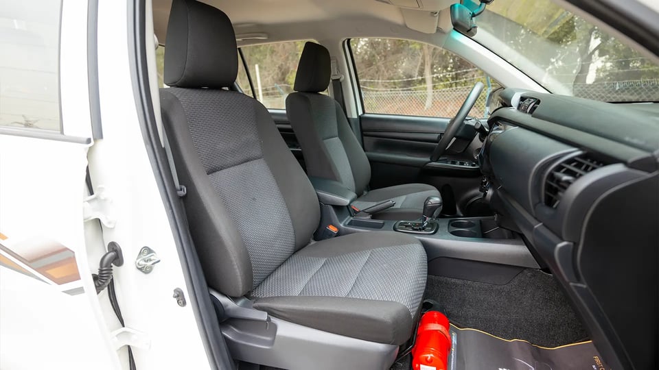 Used 2024 Toyota Hilux GL Double Cabin in White – Front Passenger Side Cabin View for Sale at First Choice Cars Dubai Sharjah