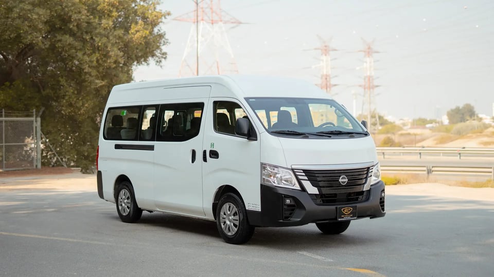 Used 2023 Nissan Urvan High Roof in White – Right Front Diagonal (45°) View for Sale at First Choice Cars Dubai Sharjah