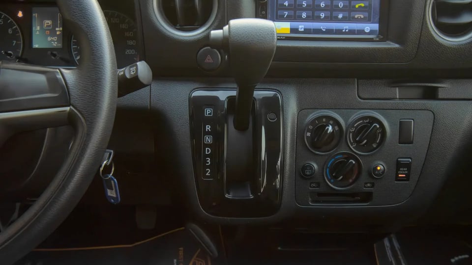 Used 2023 Nissan Urvan High Roof in White – Center Console & Gear Shifter for Sale at First Choice Cars Dubai Sharjah