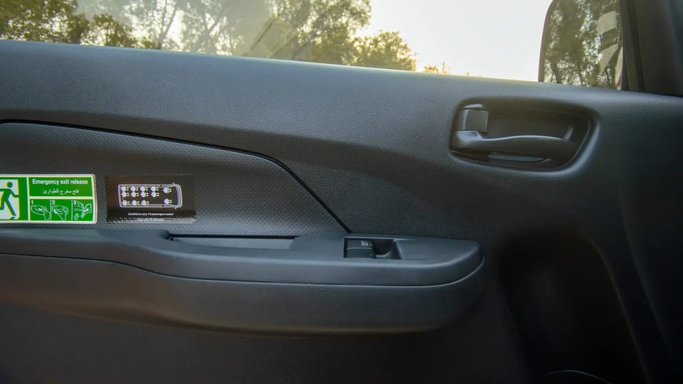 Used 2023 Nissan Urvan High Roof in White – Driver Door Panel Full View for Sale at First Choice Cars Dubai Sharjah