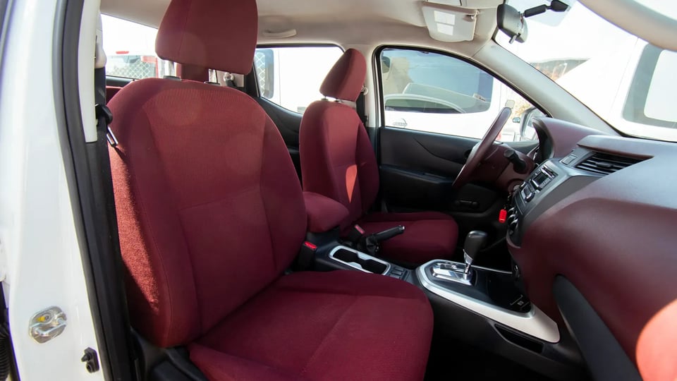 Used 2022 Nissan Navara SE in White – Front Passenger Side Cabin View for Sale at First Choice Cars Dubai Sharjah