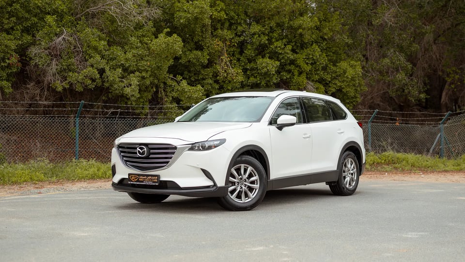 Used 2020 Mazda CX-9 GT in White – Left Front Diagonal (45°) View for Sale at First Choice Cars Dubai Sharjah