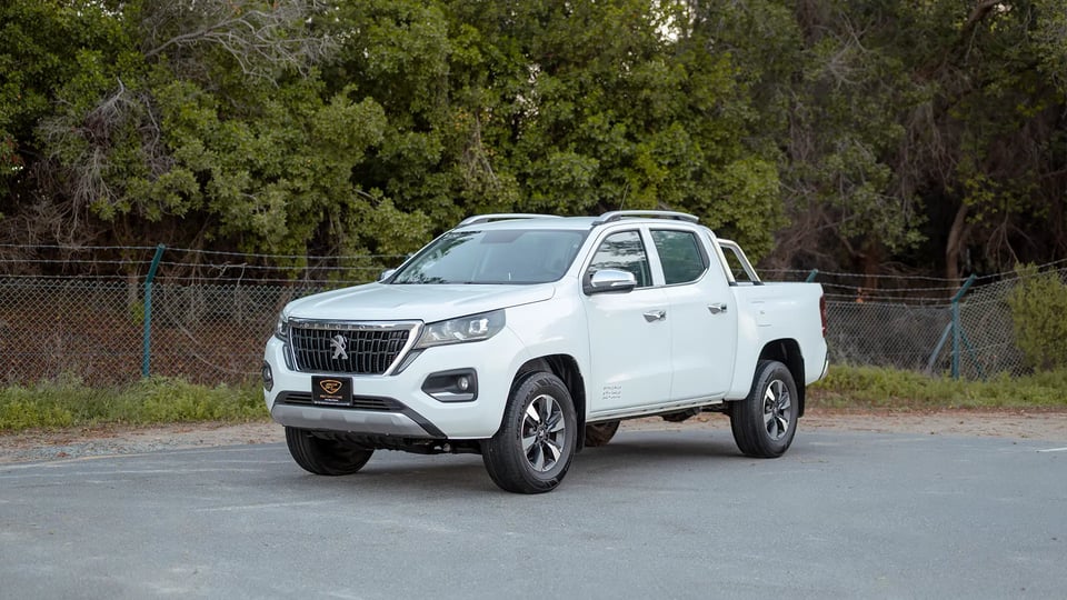 Used 2023 Peugeot Landtrek Double Cabin in White – Left Front Diagonal (45°) View for Sale at First Choice Cars Dubai Sharjah