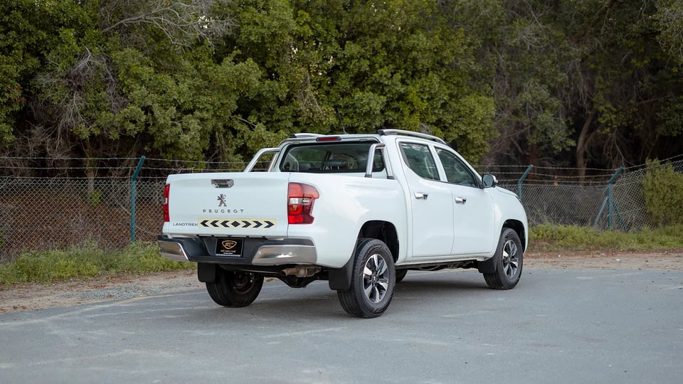 Used 2023 Peugeot Landtrek Double Cabin in White – Right Back Diagonal (45°) View for Sale at First Choice Cars Dubai Sharjah