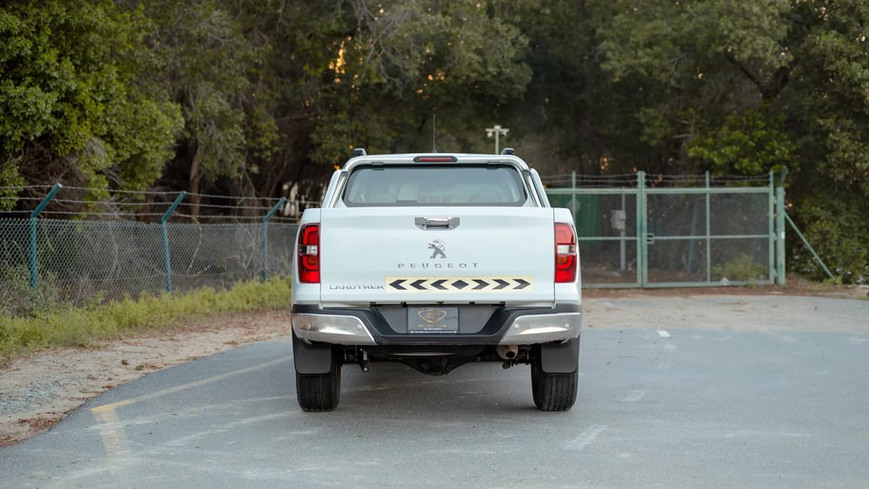Used 2023 Peugeot Landtrek Double Cabin in White – Back/Rear View for Sale at First Choice Cars Dubai Sharjah