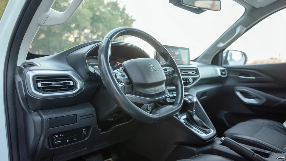 Used 2023 Peugeot Landtrek Double Cabin in White – Driver Side Dashboard & Steering View for Sale at First Choice Cars Dubai Sharjah