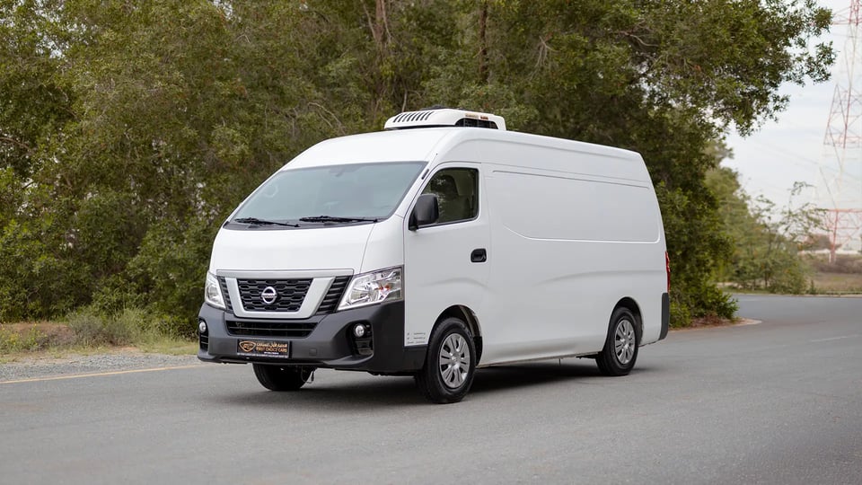 Used 2022 Nissan Urvan High Roof in White – Left Front Diagonal (45°) View for Sale at First Choice Cars Dubai Sharjah