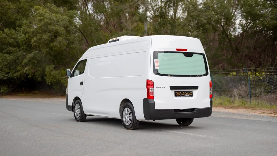 Used 2022 Nissan Urvan High Roof in White – Left Back Diagonal (45°) View for Sale at First Choice Cars Dubai Sharjah