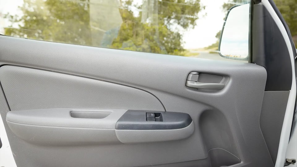 Used 2022 Nissan Urvan High Roof in White – Driver Door Panel Full View for Sale at First Choice Cars Dubai Sharjah