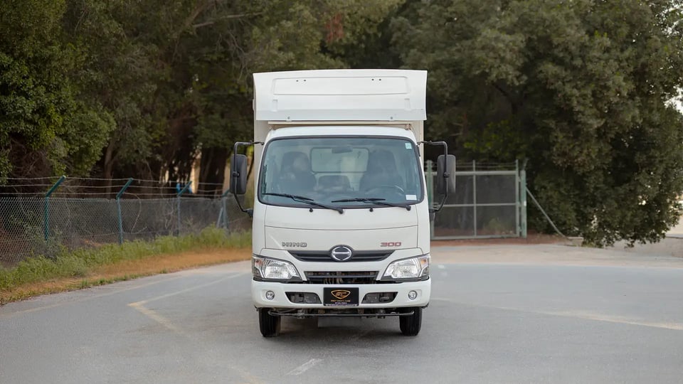 Used 2019 Hino 300 Dry Box in White – Front View for Sale at First Choice Cars Dubai Sharjah