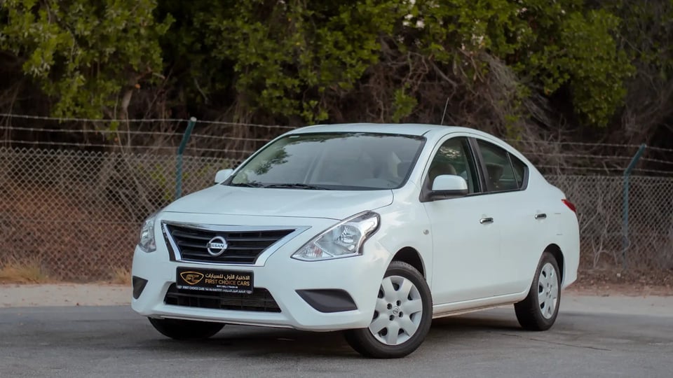 Used 2023 Nissan Sunny SV in White – Left Front Diagonal (45°) View for Sale at First Choice Cars Dubai Sharjah