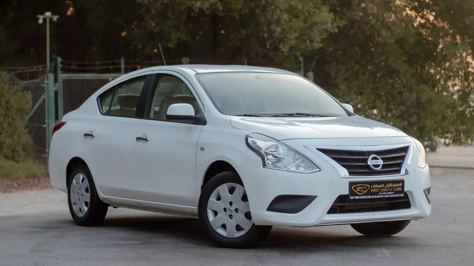 Used 2023 Nissan Sunny SV in White – Right Front Diagonal (45°) View for Sale at First Choice Cars Dubai Sharjah