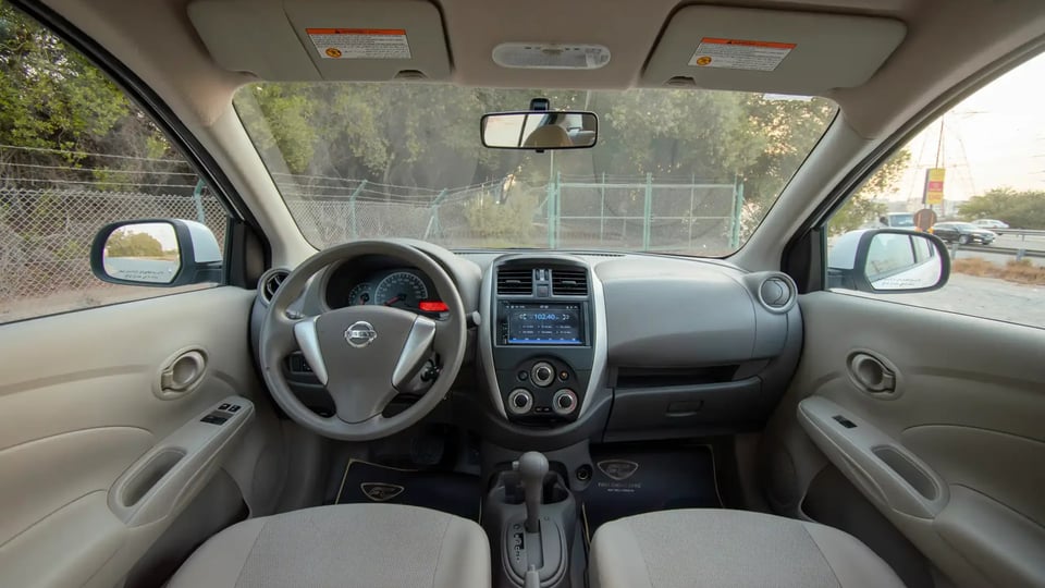 Used 2023 Nissan Sunny SV in White – Front Cabin / Dashboard Full View for Sale at First Choice Cars Dubai Sharjah