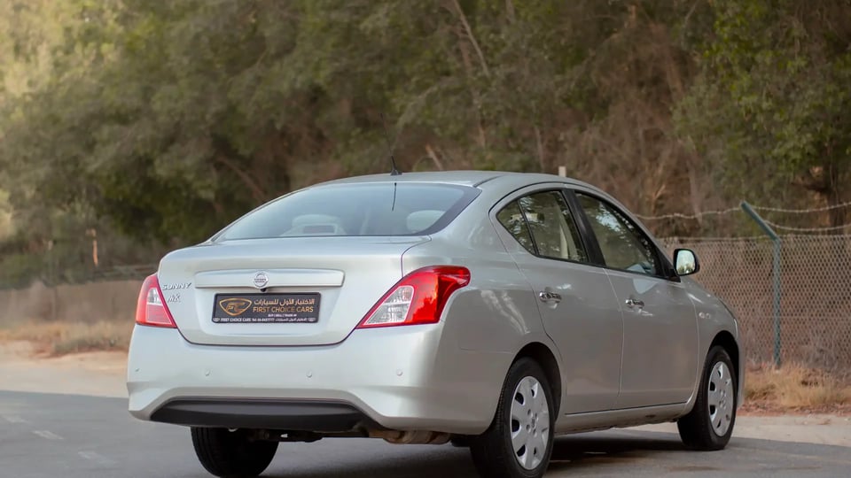 Used 2022 Nissan Sunny SV in Silver – Right Back Diagonal (45°) View for Sale at First Choice Cars Dubai Sharjah