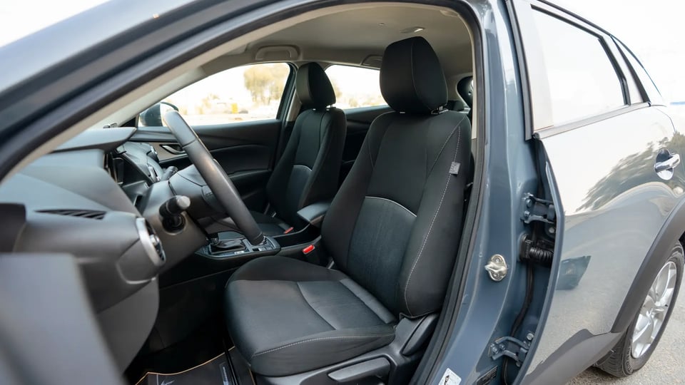 Used 2023 Mazda CX-3 GS in Grey – Front Driver Side Cabin View for Sale at First Choice Cars Dubai Sharjah