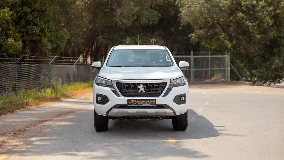 Used 2023 Peugeot Landtrek Double Cabin in White – Front View for Sale at First Choice Cars Dubai Sharjah