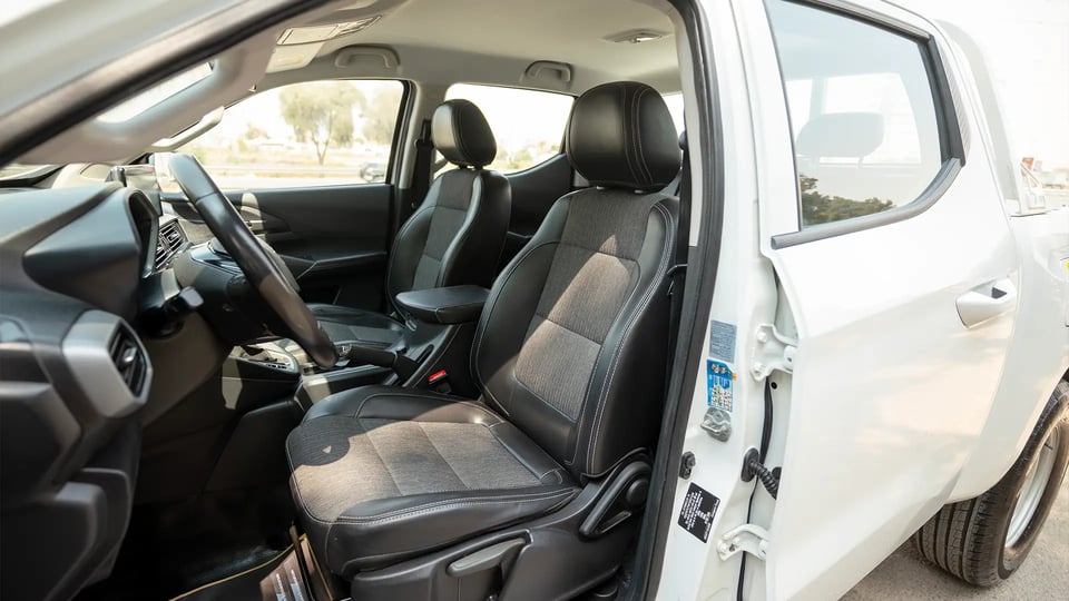 Used 2023 Peugeot Landtrek Double Cabin in White – Front Driver Side Cabin View for Sale at First Choice Cars Dubai Sharjah