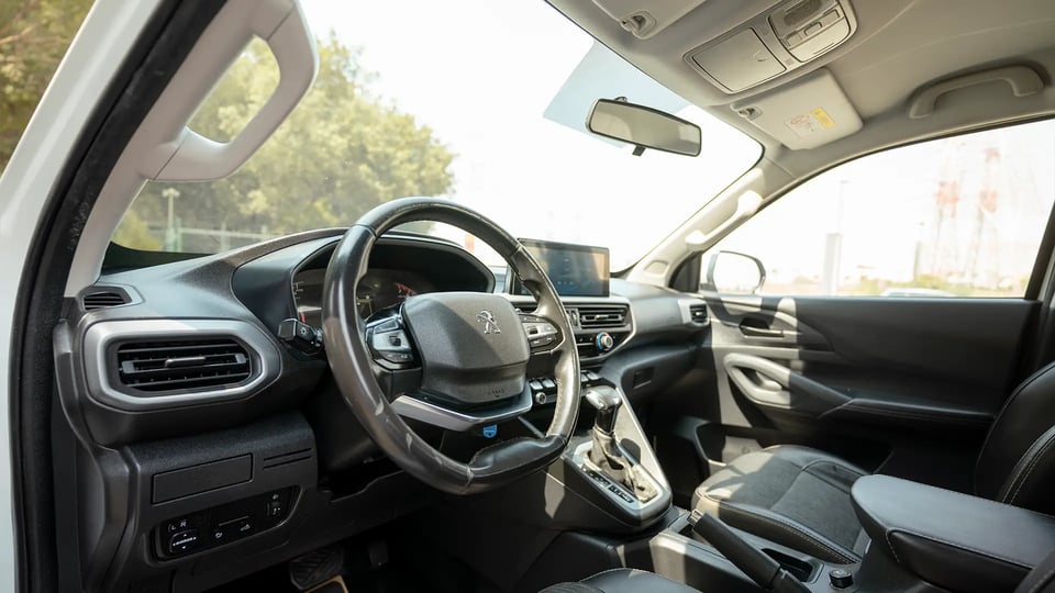 Used 2023 Peugeot Landtrek Double Cabin in White – Driver Side Dashboard & Steering View for Sale at First Choice Cars Dubai Sharjah