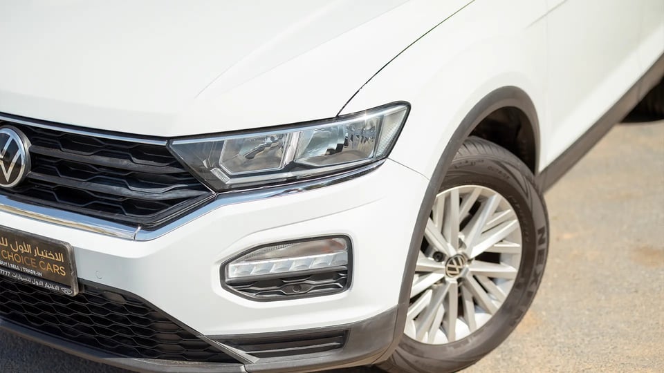 Used 2021 Volkswagen T-Roc Trend in White – Headlight Close-up for Sale at First Choice Cars Dubai Sharjah