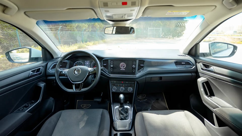 Used 2021 Volkswagen T-Roc Trend in White – Front Cabin / Dashboard Full View for Sale at First Choice Cars Dubai Sharjah