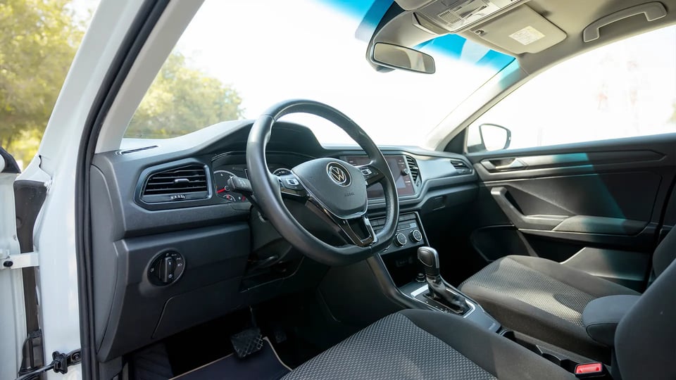 Used 2021 Volkswagen T-Roc Trend in White – Driver Side Dashboard & Steering View for Sale at First Choice Cars Dubai Sharjah