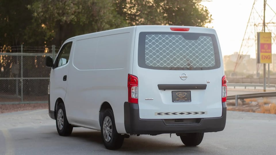 Used 2022 Nissan Urvan Standard Roof in White – Left Back Diagonal (45°) View for Sale at First Choice Cars Dubai Sharjah