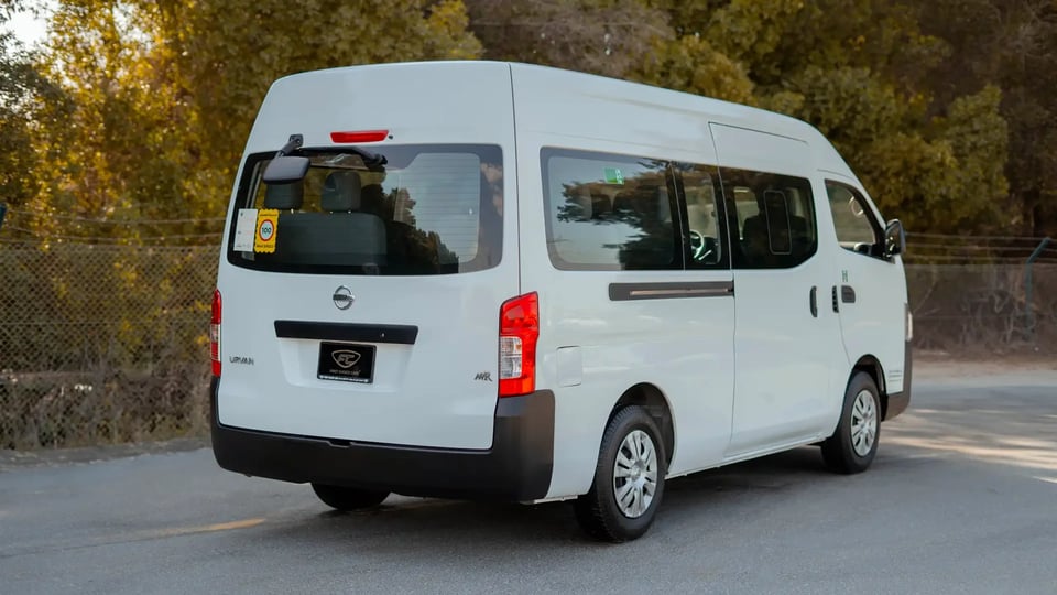 Used 2021 Nissan Urvan High Roof in White – Right Back Diagonal (45°) View for Sale at First Choice Cars Dubai Sharjah