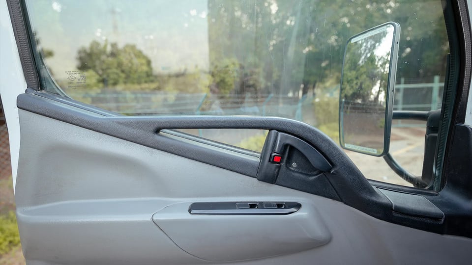 Used 2023 Mitsubishi Canter Chiller Box in White – Driver Door Panel Full View for Sale at First Choice Cars Dubai Sharjah