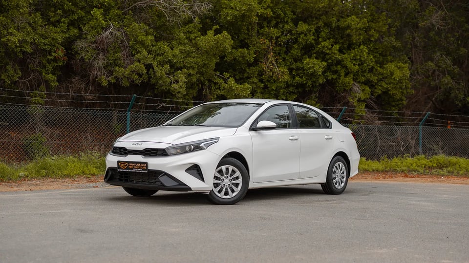 Used 2023 Kia Cerato LX in White – Left Front Diagonal (45°) View for Sale at First Choice Cars Dubai Sharjah