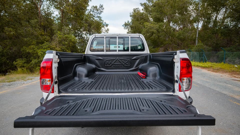 Used 2021 Toyota Hilux DLX Double Cabin in White – Boot / Trunk Space Open View for Sale at First Choice Cars Dubai Sharjah
