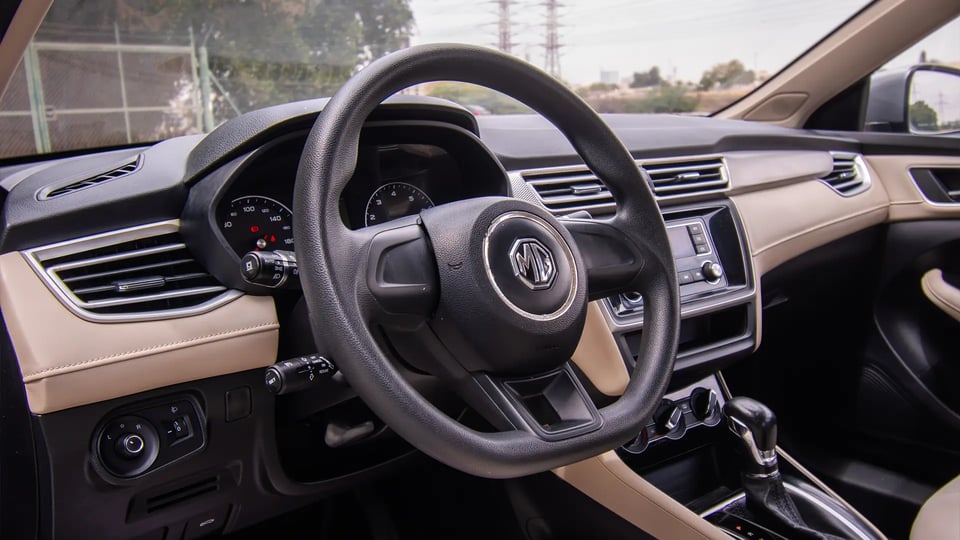 Used 2022 MG 5 Comfort in Silver – Driver Side Dashboard & Steering View for Sale at First Choice Cars Dubai Sharjah