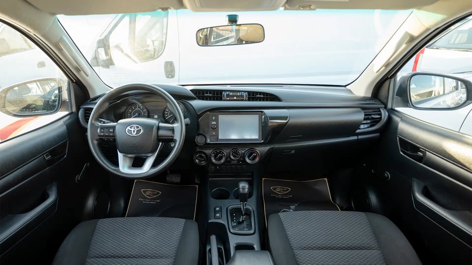 Used 2021 Toyota Hilux GLX Double Cabin in White – Front Cabin / Dashboard Full View for Sale at First Choice Cars Dubai Sharjah