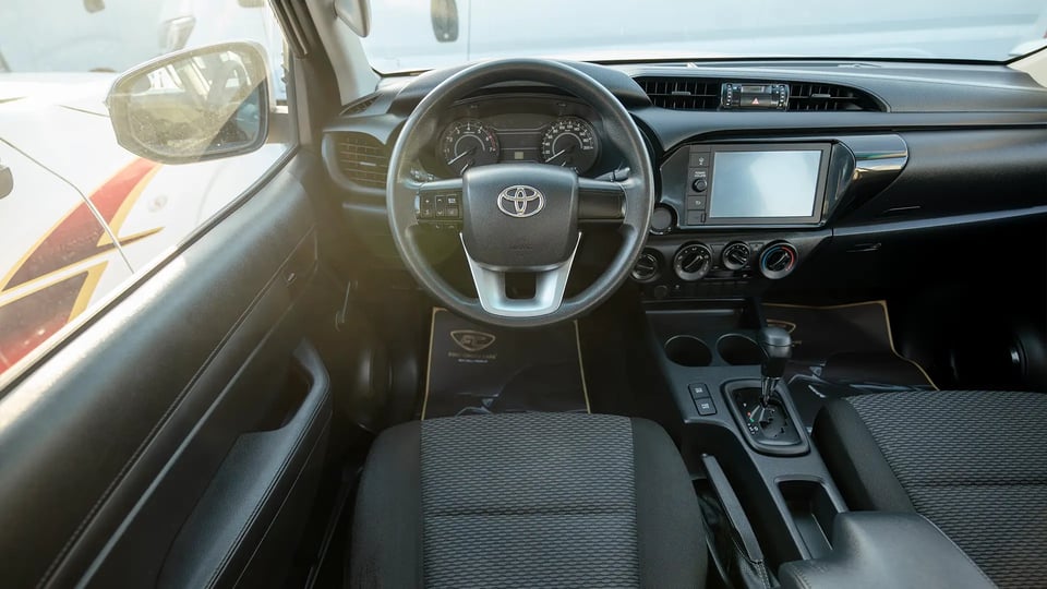 Used 2021 Toyota Hilux GLX Double Cabin in White – Steering Wheel & Instrument Cluster for Sale at First Choice Cars Dubai Sharjah