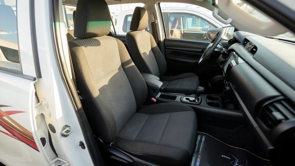 Used 2021 Toyota Hilux GLX Double Cabin in White – Front Passenger Side Cabin View for Sale at First Choice Cars Dubai Sharjah