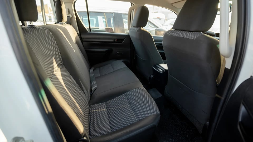 Used 2021 Toyota Hilux GLX Double Cabin in White – Rear Passenger Side Cabin View for Sale at First Choice Cars Dubai Sharjah