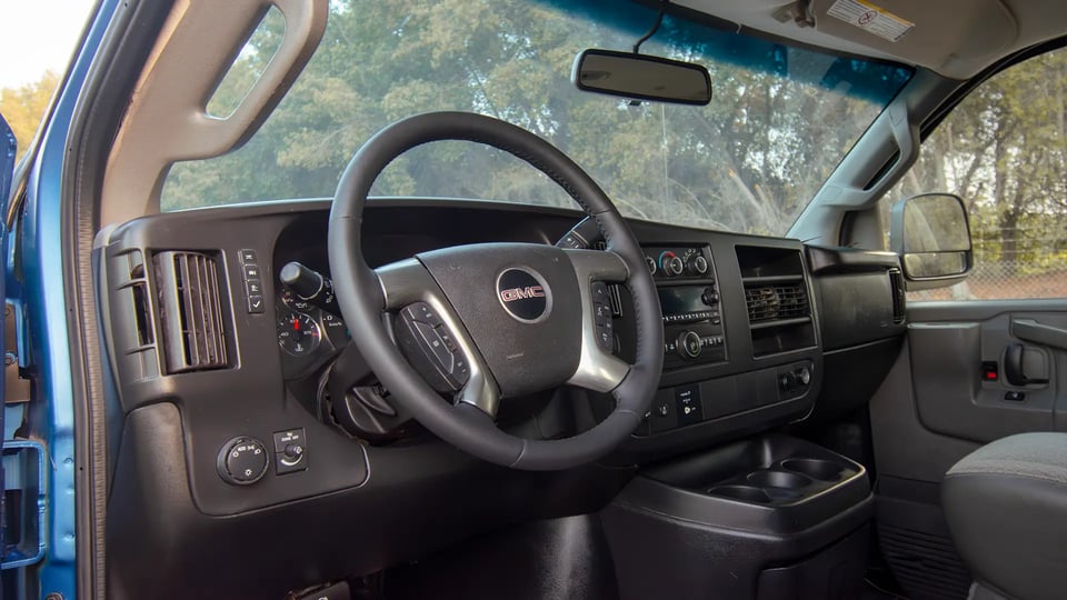 Used 2019 GMC Savana Passanger Van in Blue – Driver Side Dashboard & Steering View for Sale at First Choice Cars Dubai Sharjah