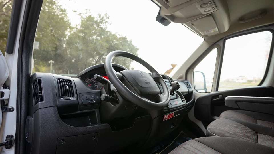 Used 2022 Peugeot Boxer L2h2 in White – Driver Side Dashboard & Steering View for Sale at First Choice Cars Dubai Sharjah