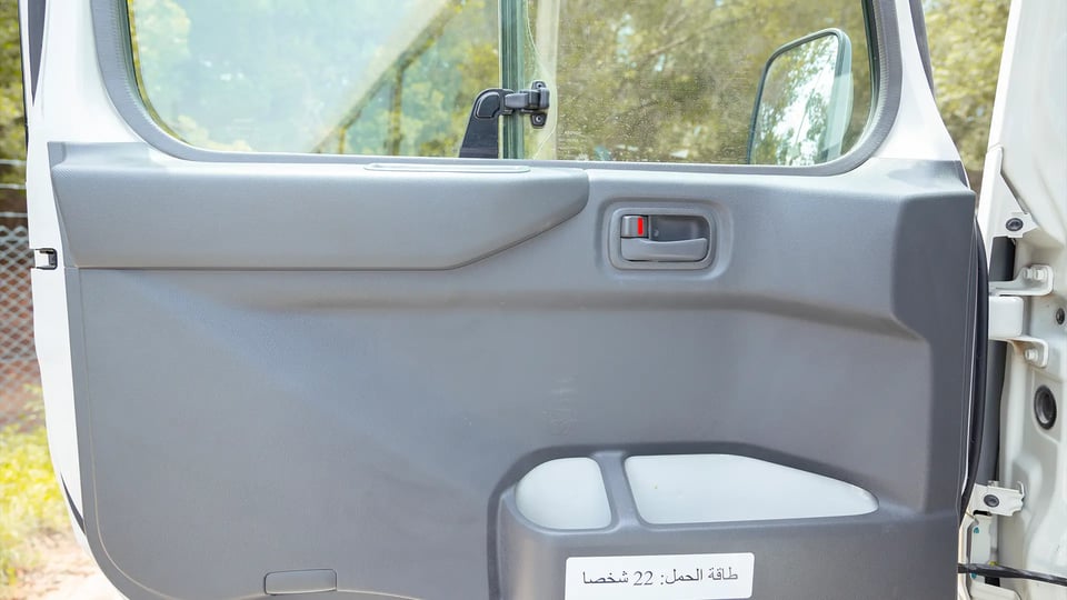 Used 2022 Toyota Coaster High Roof in White – Driver Door Panel Full View for Sale at First Choice Cars Dubai Sharjah